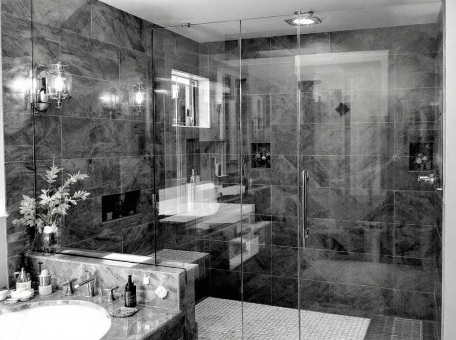 Modern custom-made frameless shower enclosure transforming a bathroom near Natick, MA.
