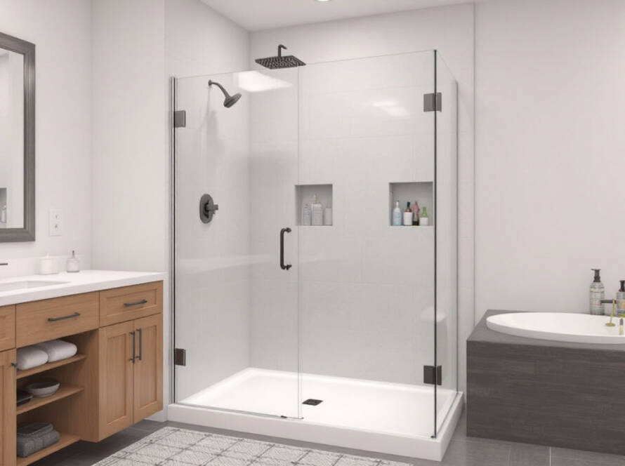 Semi frameless shower doors enhancing modern design in a Boston bathroom.