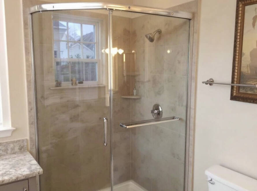 The modern and contemporary design of an expertly installed shower door in Billerica, MA.