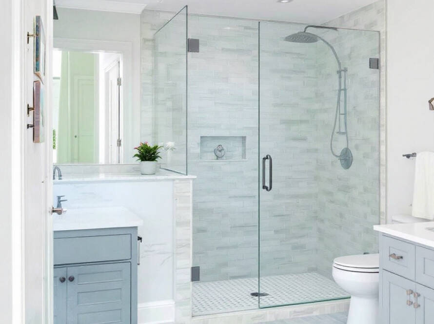 Skilled professionals from Boston-based services expertly installing modern, contemporary glass shower doors in Norwood, MA.