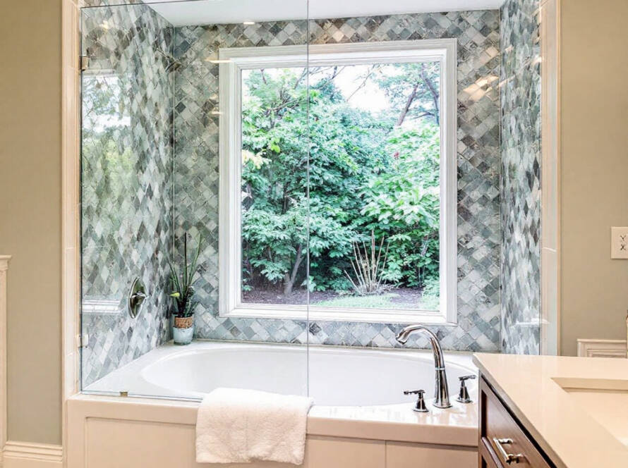 A high-quality image showcasing the expertise in bathtub door installation in Medfield, MA, exuding a contemporary, modern design and freshness.