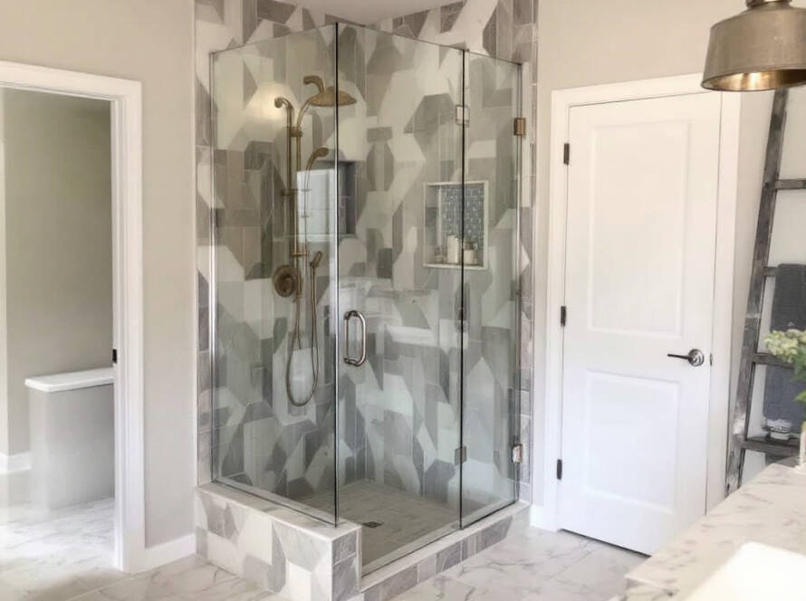 Modern and contemporary custom shower door design installation enhancing the aesthetics of a bathroom in Boston.