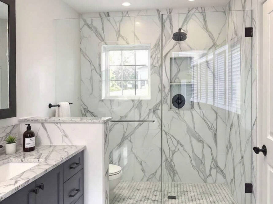 A newly installed contemporary shower door enhancing bath experience in Sudbury, MA.