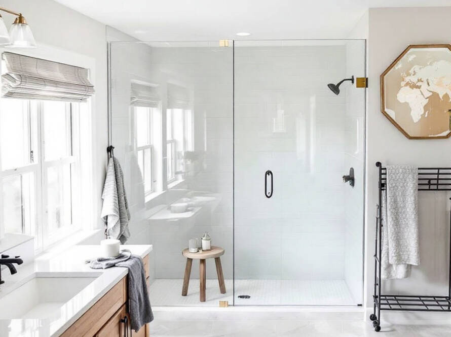 Alt Text: "Custom frameless glass shower doors displaying modern, contemporary design in Ashland MA."