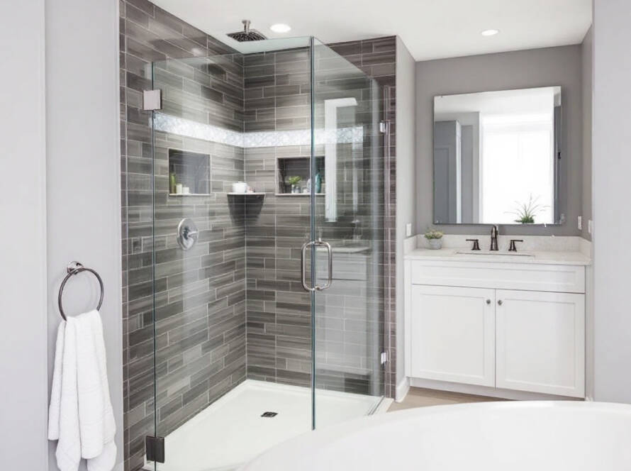"A meticulously installed, modern designed shower door by expert craftsmen in Chelsea, MA, adding contemporary elegance to a new household."