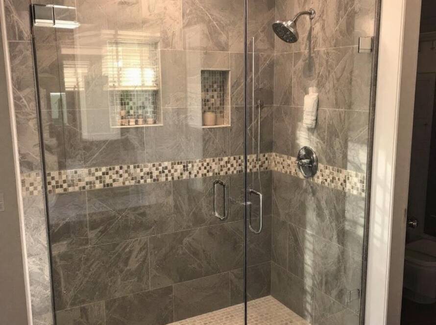 Modern contemporary design shower door installed in a Boston bathroom.