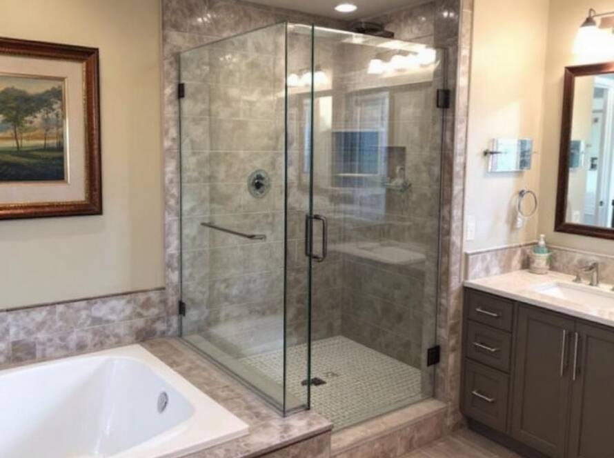 Alt Text: Expert craftsmen installing a modern and contemporary styled shower door in Boxborough, MA.