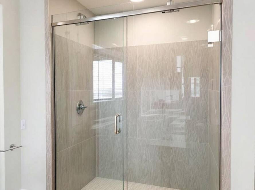 Alt Text: "Close-up view of an expertly installed modern and contemporary shower door in Allston, MA."