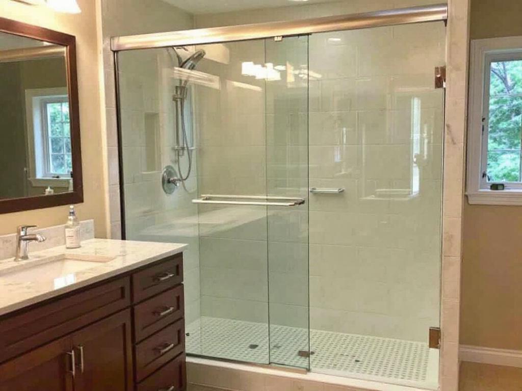 Modern and contemporary designed sliding shower door installed by expert professionals in Stoneham, MA.
