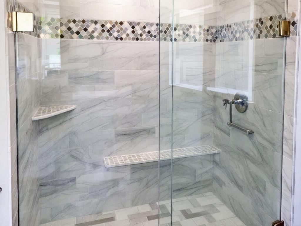Glass shower door installment in a custom bathroom in Medford, MA.