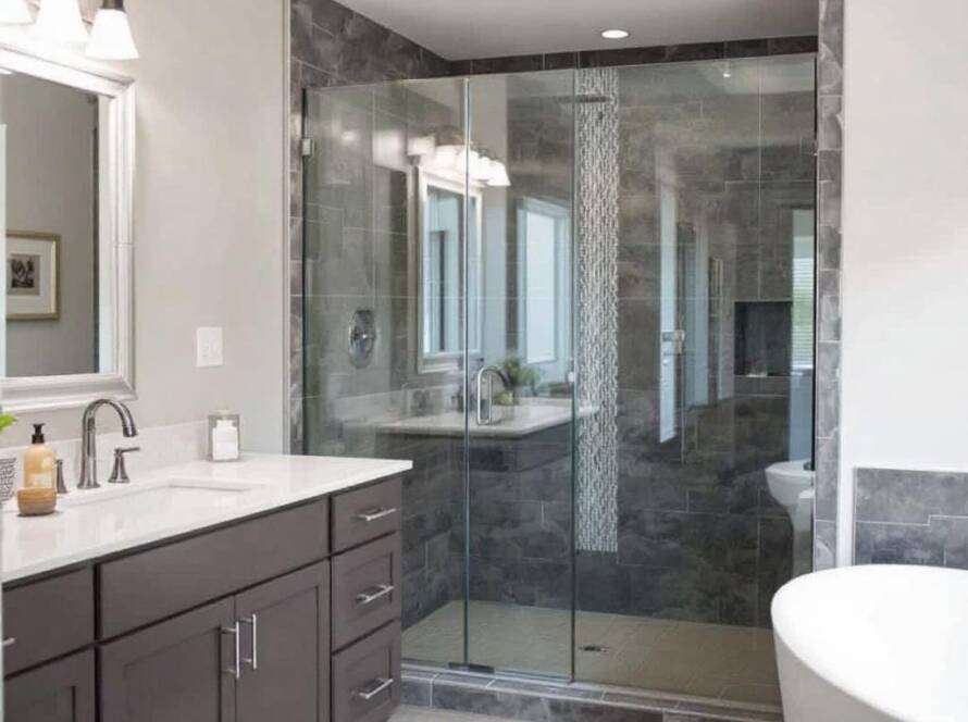 Modern and contemporary designed custom shower door uplifting the overall bathroom experience.