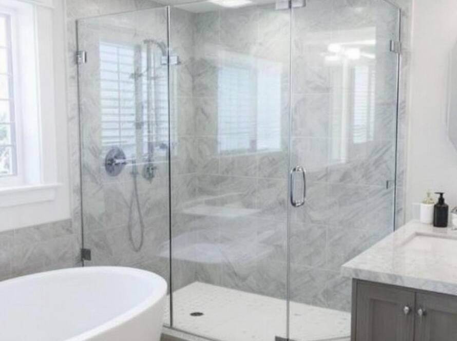 Frameless shower glass with sleek and modern design newly installed in Maynard, MA.