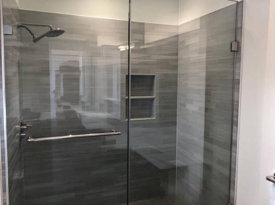 A comprehensive manual to installing glass shower doors, rejuvenating your bathroom aesthetic with modern design in Revere, MA.