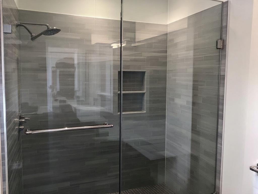 A comprehensive manual to installing glass shower doors, rejuvenating your bathroom aesthetic with modern design in Revere, MA.