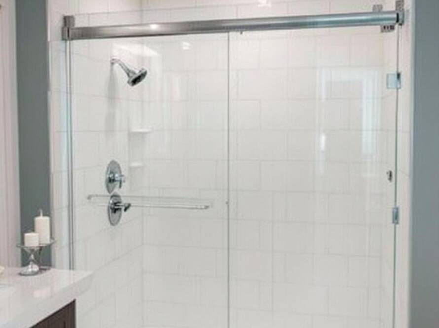 The superior craftsmanship of a contemporary design shower door installation near Reading, MA.