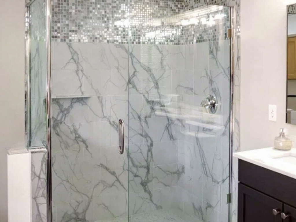 Skilled workers installing a sliding shower door in Stoneham, Massachusetts for a perfect shower experience.