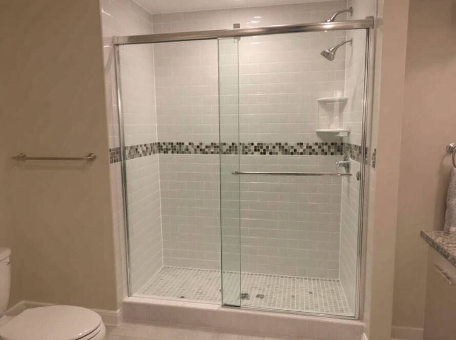 Modern and contemporary design of sliding shower door installation by expert installers in Winchester, MA.